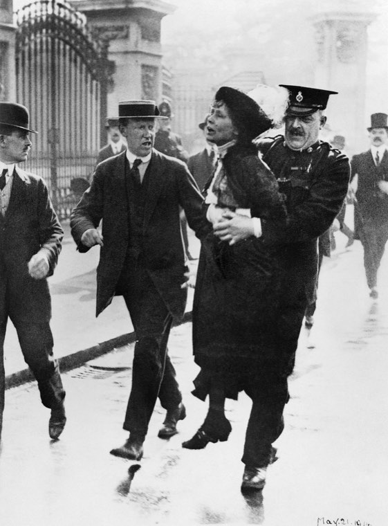 Emmeline Pankhurst being carried away by a police officer